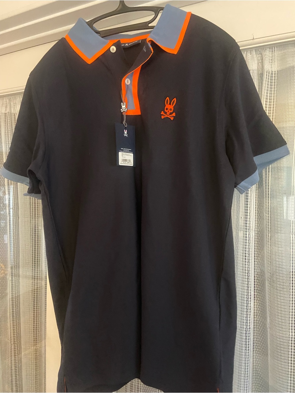 Psycho Bunny Navy Polo with Orange Trim and Light Blue Collar